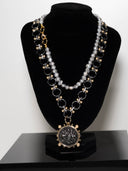 collana gemellus argento scuro inserti oro medaglione