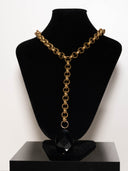 collana milia cerchi dorati e grande pietra onice nera