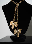 collana folia catena oro con foglie dorate alle estremità
