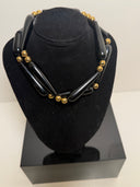 Choker perline a goccia in onice e oro