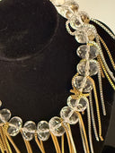 choker mezzi cristalli trasparenti s forma leggermente schiacciata fili color oro e argento , elastico