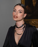 collana gentilis 3 fili perline nere  bacchette dorate