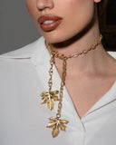 collana folia catena oro con foglie dorate alle estremità